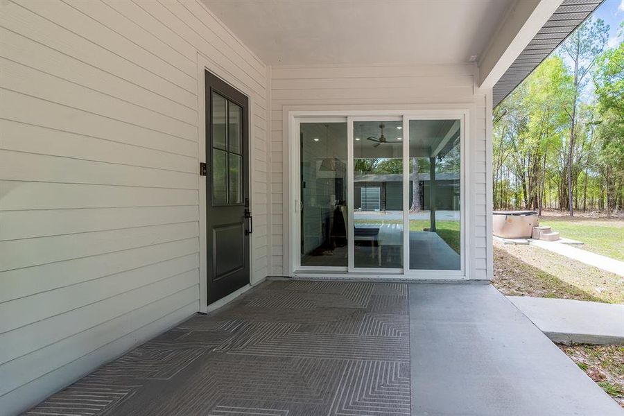 Exterior details and patio area of a home in , Fort White (Image 24).