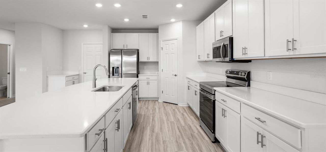 Furnished interior view inside a new home in The Crossings - Single-Family Homes, St. Cloud (Image 5). Furnished interior view inside a new home in The Crossings - Single-Family Homes, St. Cloud (Image 5).
