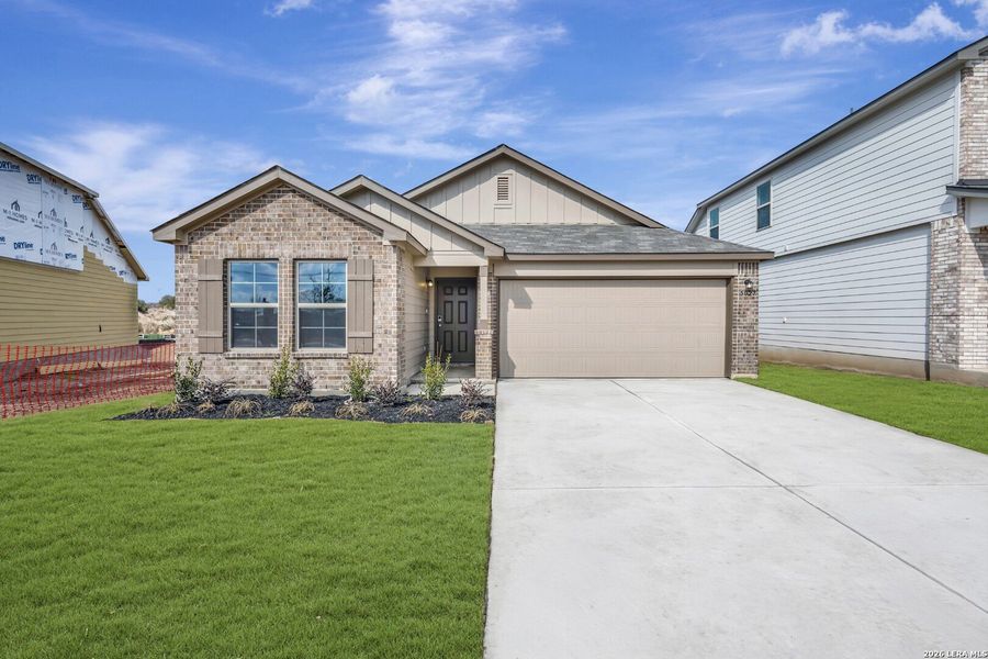 Front exterior of a new home in Agave, San Antonio, TX, highlighting curb appeal (Image 2). Front exterior of a new home in Agave, San Antonio, TX, highlighting curb appeal (Image 2).