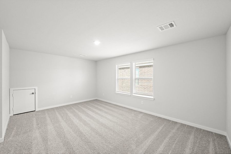 Spacious, unfurnished interior of a new home in Sunterra, Katy (Image 19).