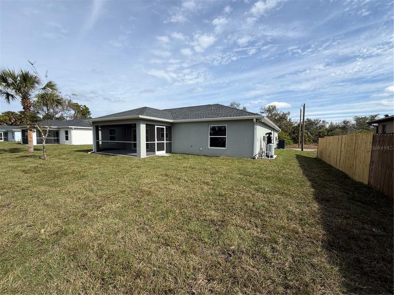 Exterior details and patio area of a home in , North Port (Image 24).