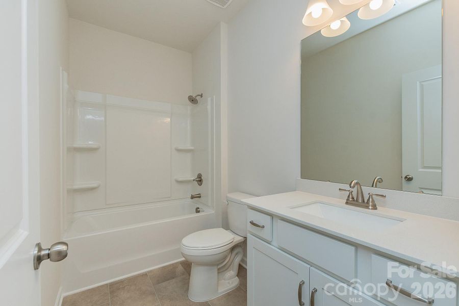 Furnished interior view inside a new home in Country Club Village, Salisbury (Image 12).