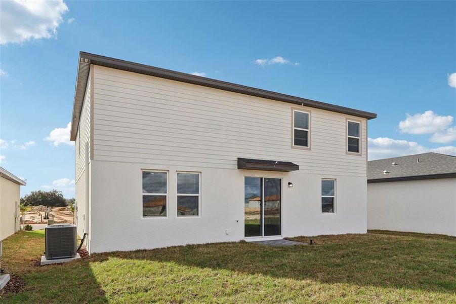 Exterior details and patio area of a home in , Davenport (Image 22).