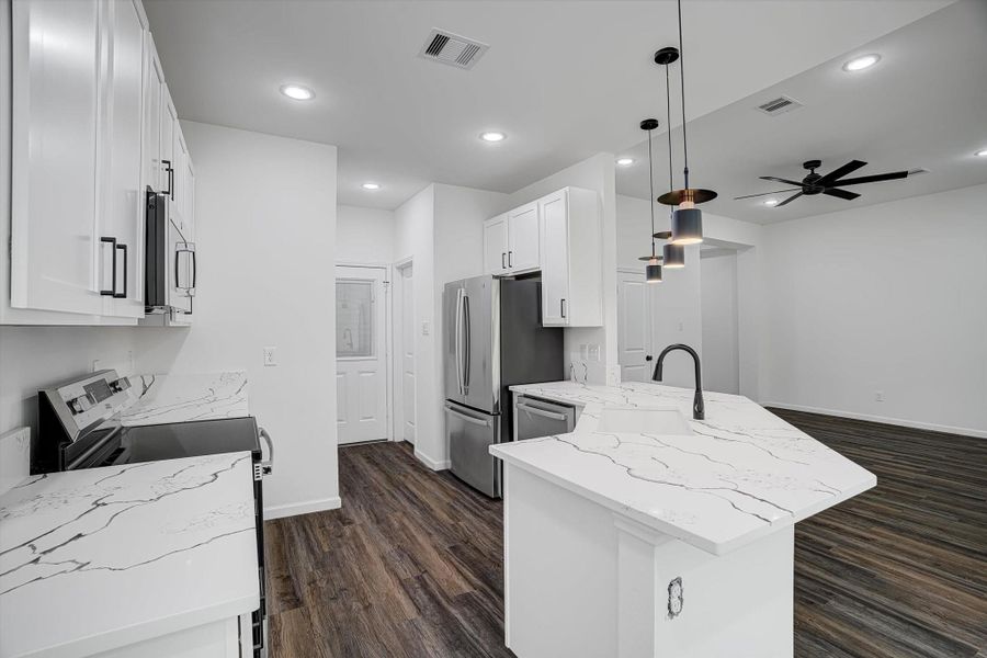 Furnished interior view inside a new home in , Kenefick (Image 5).