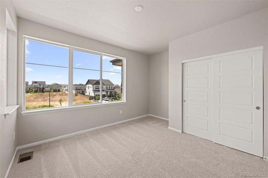 Spacious, unfurnished interior of a new home in Painted Prairie, Aurora (Image 20).