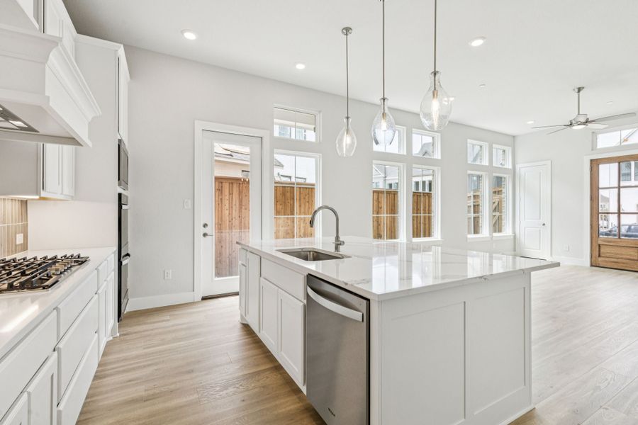 Representative furnished interior of a home built from the Hamilton by Centre Living Homes in Newman Village Townhomes, Frisco (Image 8).