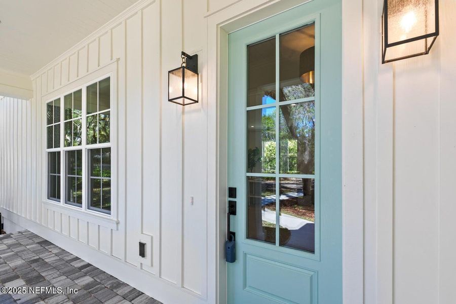 Exterior details and patio area of a home in , Neptune Beach (Image 28).
