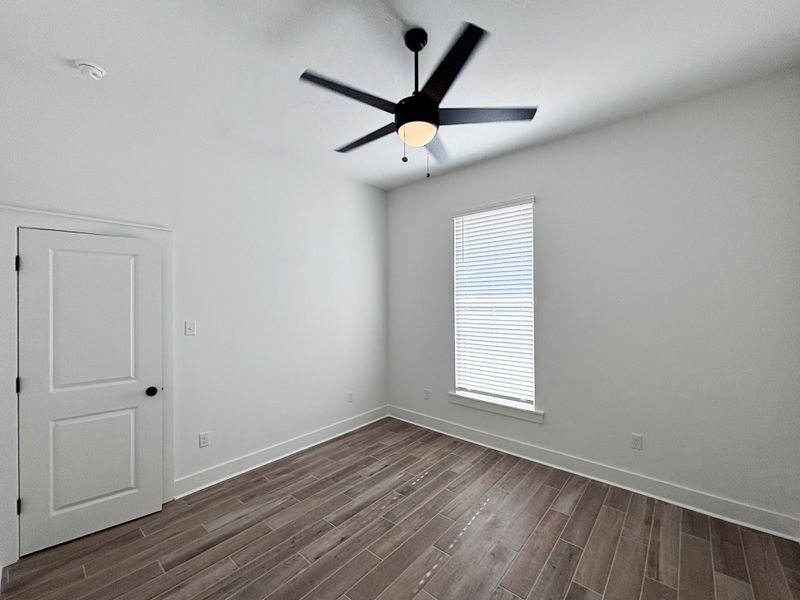 Spacious, unfurnished interior of a new home in Bird Song at Hammock Bay, Freeport (Image 20).