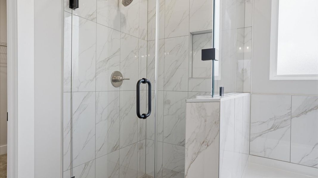 Exceptional en-suite with a glass-enclosed walk-in shower for superior everyday comfort at Woodglen Exceptional en-suite with a glass-enclosed walk-in shower for superior everyday comfort at Woodglen