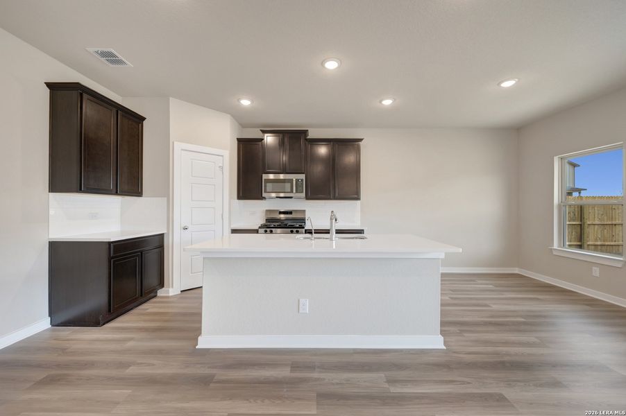 Furnished interior view inside a new home in Winding Brook, San Antonio (Image 6).