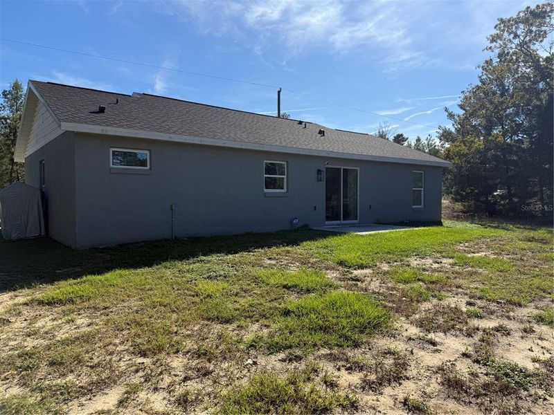 Exterior details and patio area of a home in , Ocklawaha (Image 18).