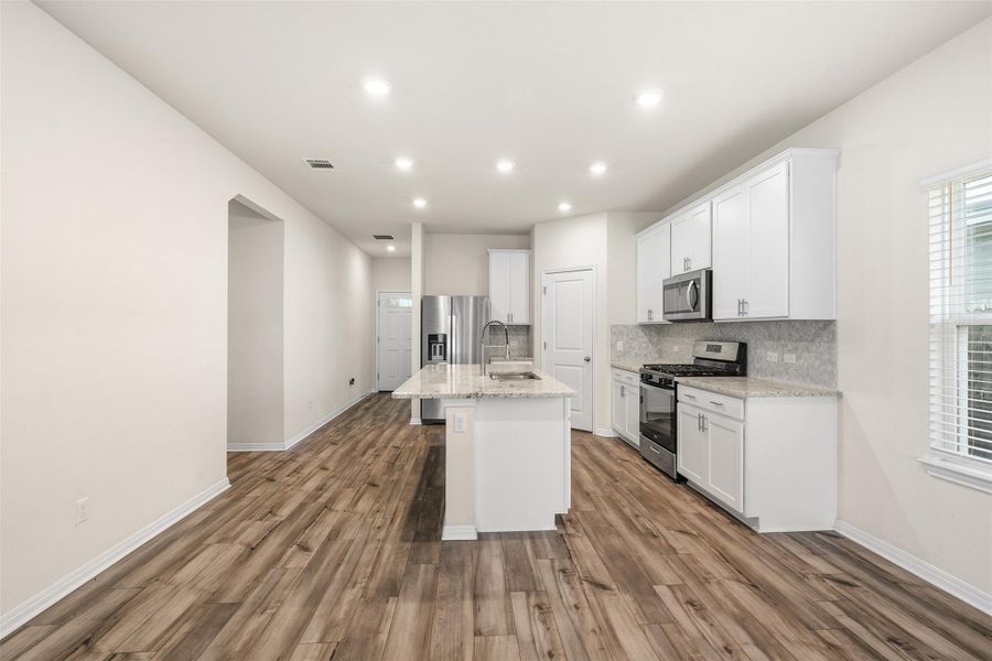 Furnished interior view inside a new home in Butler Farms - Reserve Collection, Liberty Hill (Image 6).