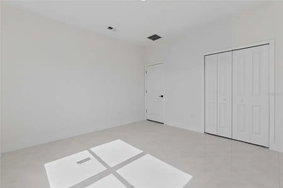 Spacious, unfurnished interior of a new home in , Port Charlotte (Image 47).