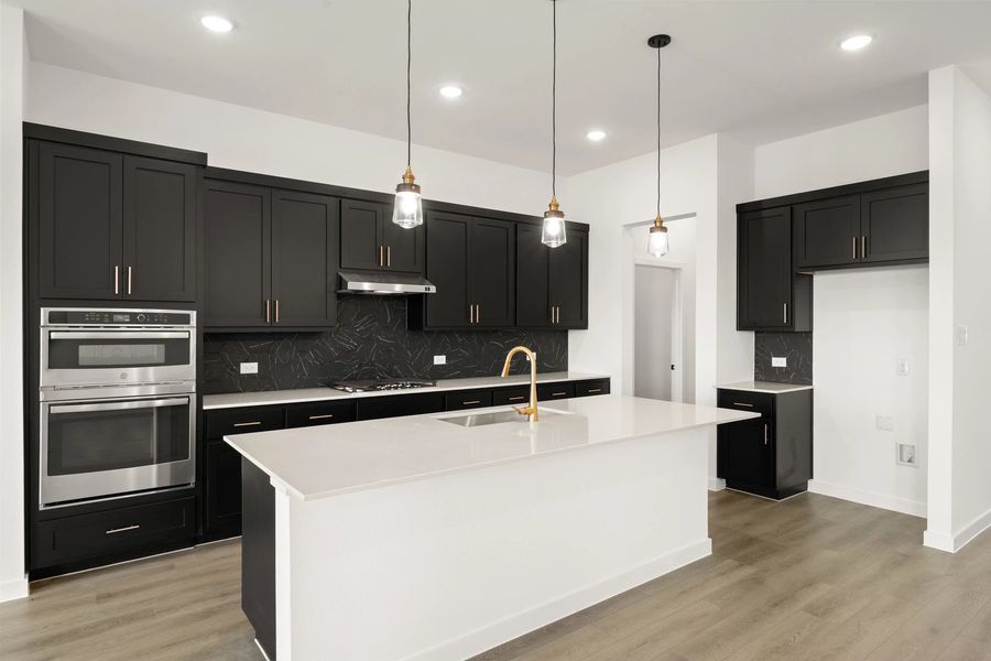 Kitchen featuring the Noir Collection Kitchen featuring the Noir Collection
