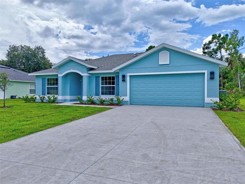 Front exterior of a new home in , Palm Coast, FL, highlighting curb appeal (Image 28).