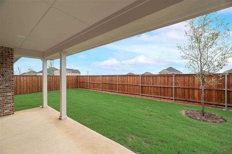 Exterior details and patio area of a home in Spiritas Ranch, Little Elm (Image 28). Exterior details and patio area of a home in Spiritas Ranch, Little Elm (Image 28).
