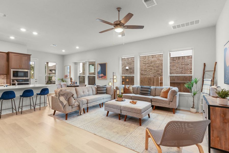 Representative furnished interior of a home built from the Wilson by Chesmar Homes in Deerbrooke Cottages, Leander (Image 4).