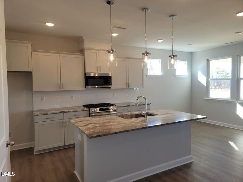 Furnished interior view inside a new home in Tobacco Road, Angier (Image 5).