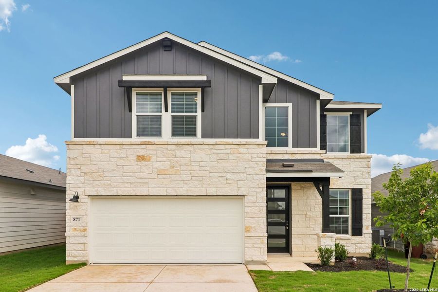 Front exterior of a new home in Estancia Ranch - Premier Series, San Antonio, TX, highlighting curb appeal (Image 1). Front exterior of a new home in Estancia Ranch - Premier Series, San Antonio, TX, highlighting curb appeal (Image 1).