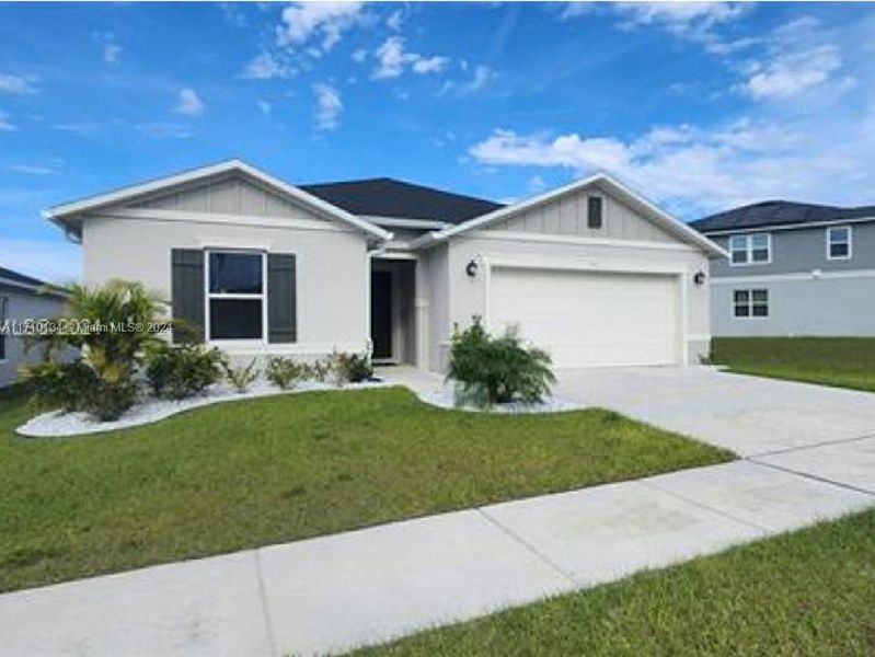 Front exterior of a new home in Lake Lucerne, Winter Haven, FL, highlighting curb appeal (Image 2). Front exterior of a new home in Lake Lucerne, Winter Haven, FL, highlighting curb appeal (Image 2).