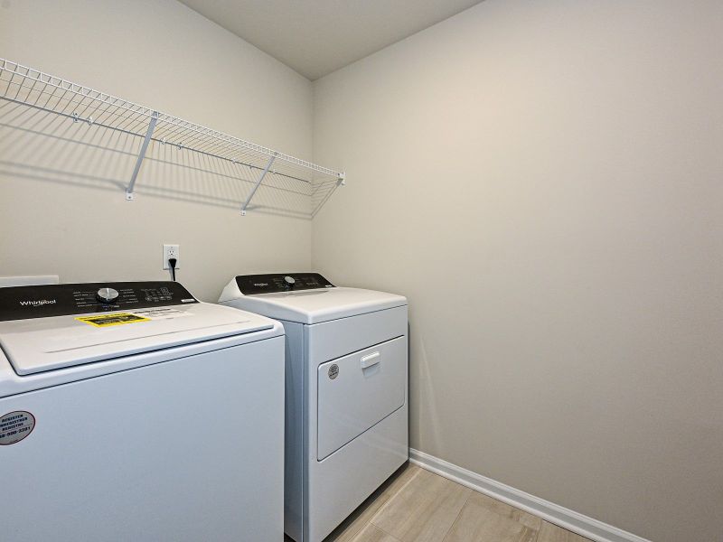 Laundry day just got easier with space and storage room to organize your essentials.