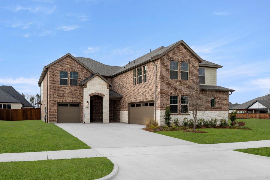 Front exterior of a new home in Somerset Park, Rockwall, TX, highlighting curb appeal (Image 1). Front exterior of a new home in Somerset Park, Rockwall, TX, highlighting curb appeal (Image 1).