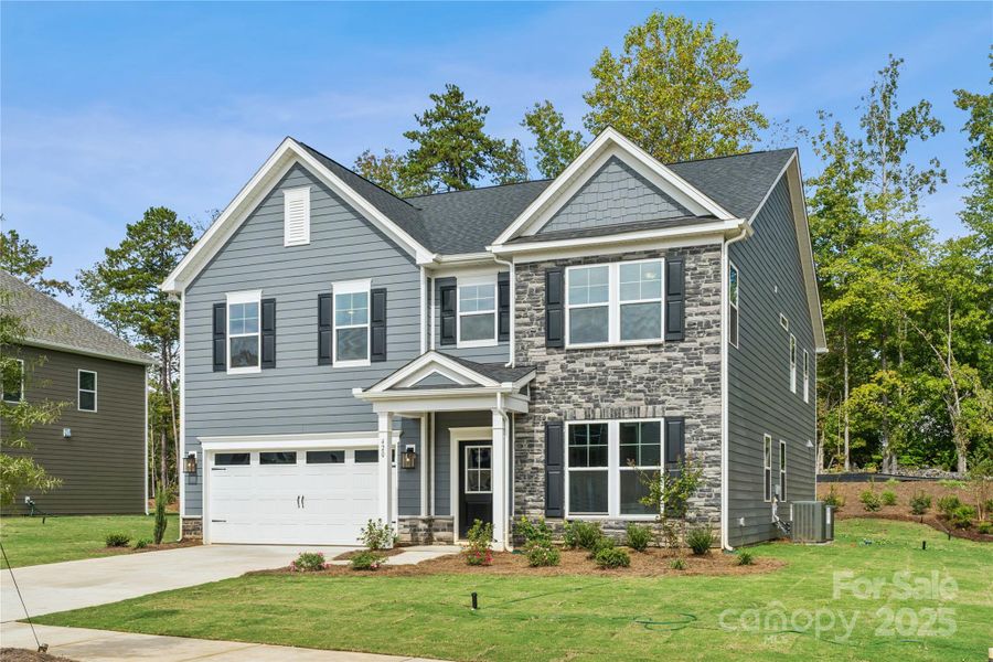 Front exterior of a new home in Glenhurst, Matthews, NC, highlighting curb appeal (Image 19).