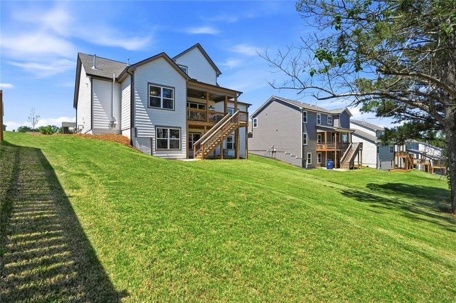 Exterior details and patio area of a home in Calgary Downs, Winder (Image 3).