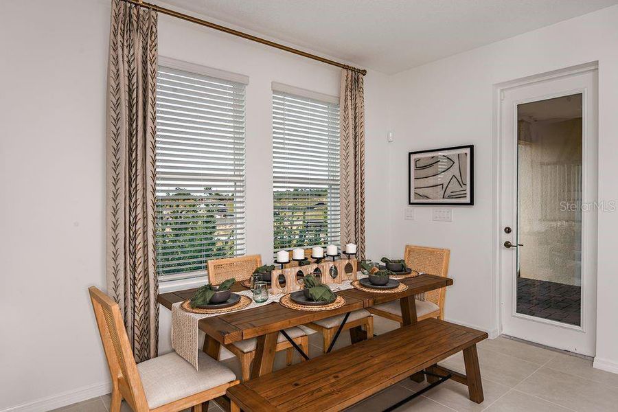 Furnished interior view inside a new home in Harvest at Ovation, Winter Garden (Image 13).
