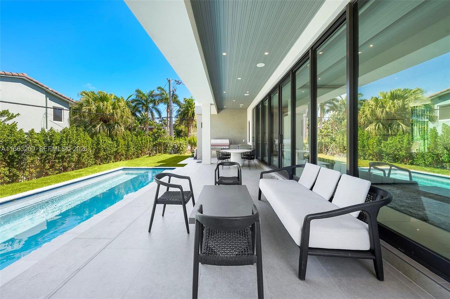 Exterior details and patio area of a home in , Miami Beach (Image 32). Exterior details and patio area of a home in , Miami Beach (Image 32).