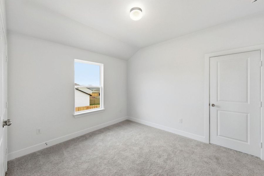 Spacious, unfurnished interior of a new home in The Colony, Bastrop (Image 24).