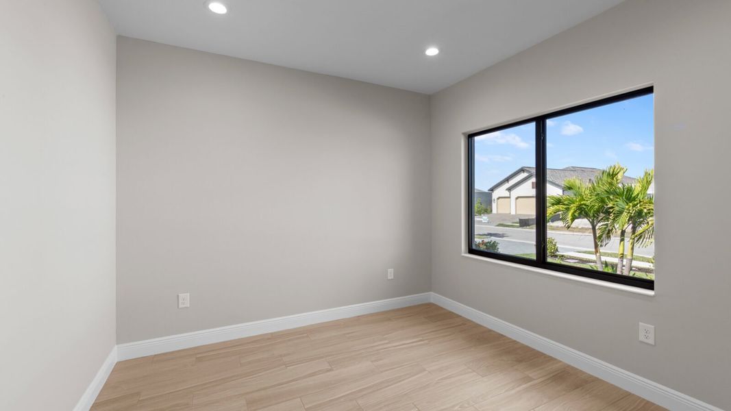 Spacious, unfurnished interior of a new home in SkySail, Naples (Image 27).