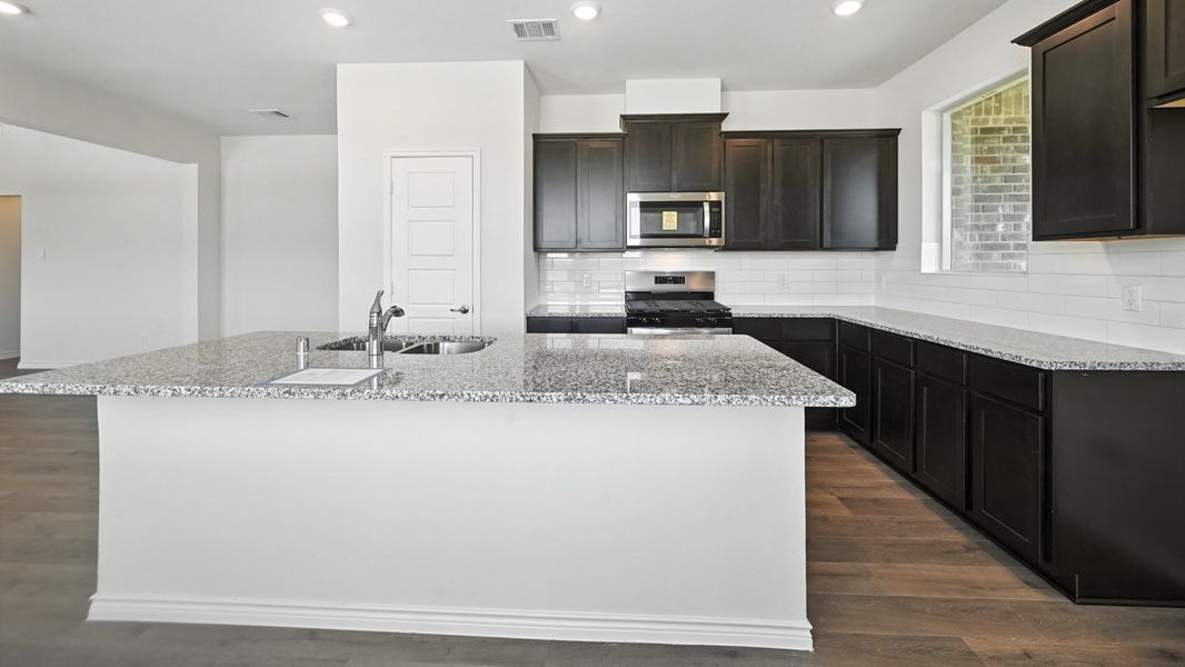 Furnished interior view inside a new home in The Woods at Lindsey Place, Anna (Image 4).