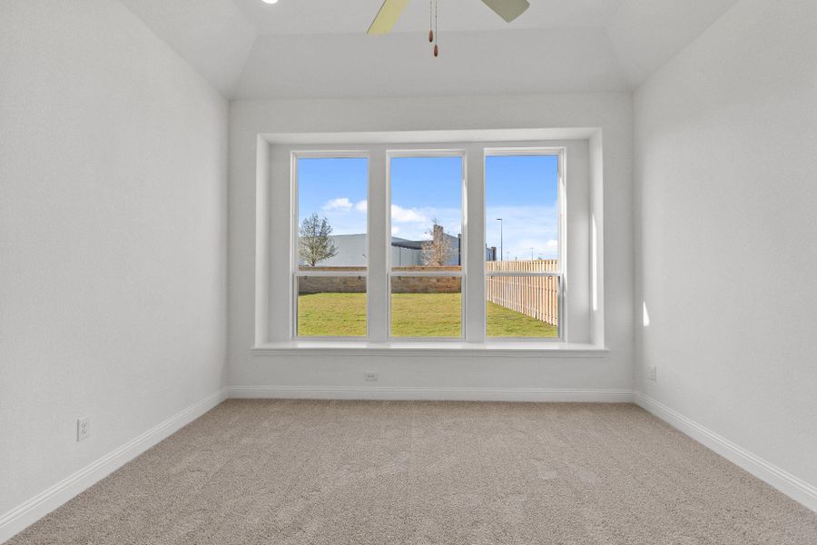 Primary Bedroom with elevated ceiling