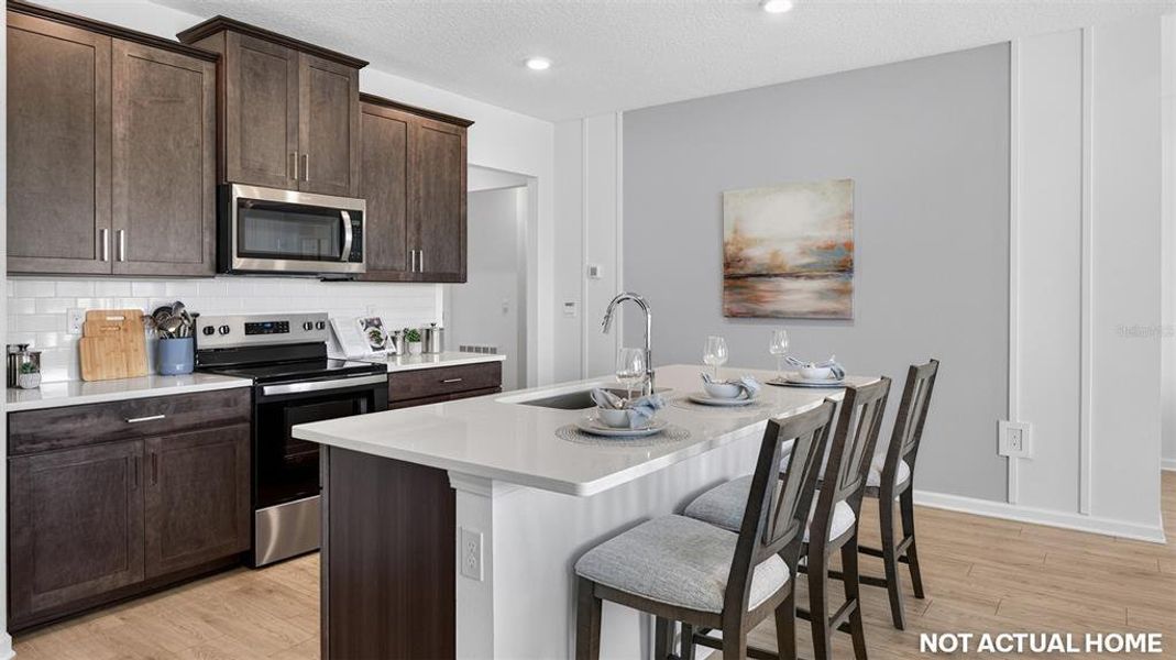Furnished interior view inside a new home in Sawmill Branch, Palm Coast (Image 7).