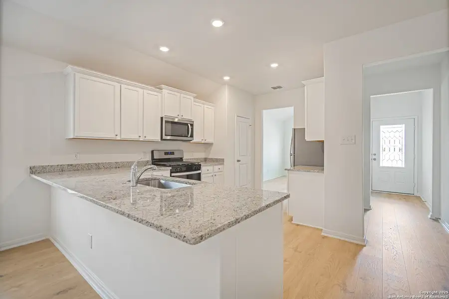 Furnished interior view inside a new home in Luckey Ranch, San Antonio (Image 3).