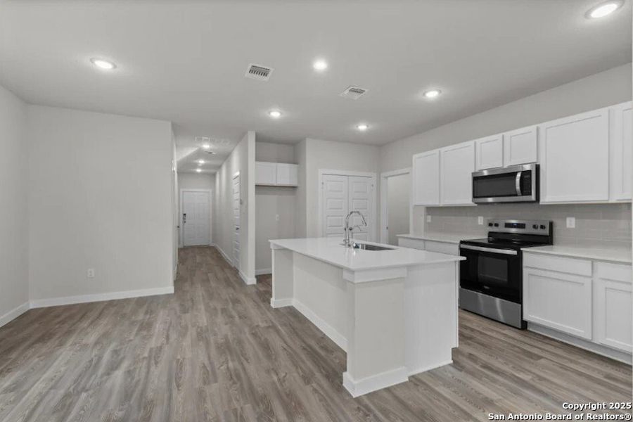 Furnished interior view inside a new home in Summerlin, San Antonio (Image 1). Furnished interior view inside a new home in Summerlin, San Antonio (Image 1).