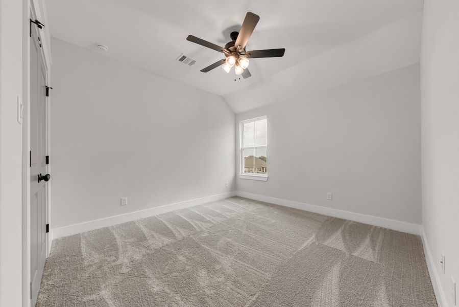 Representative unfurnished interior of a home built from the The Landry by Reece Homes in Oakmont, Bryan (Image 22).