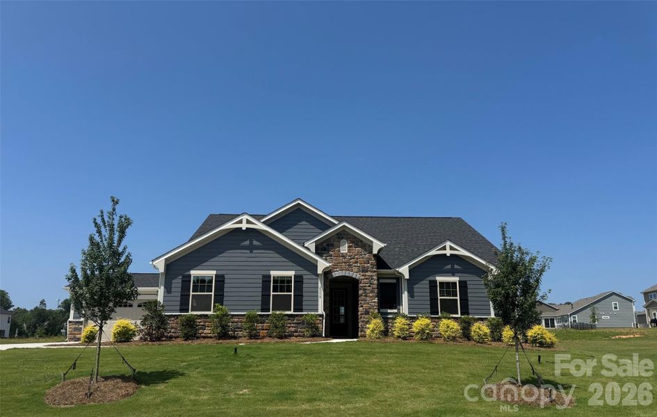 Front exterior of a new home in Blair Place, Monroe, NC, highlighting curb appeal (Image 28). Front exterior of a new home in Blair Place, Monroe, NC, highlighting curb appeal (Image 28).