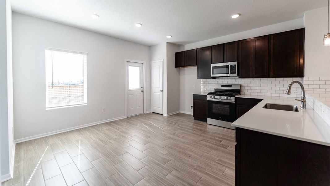 Furnished interior view inside a new home in Briarwood, Elgin (Image 5).