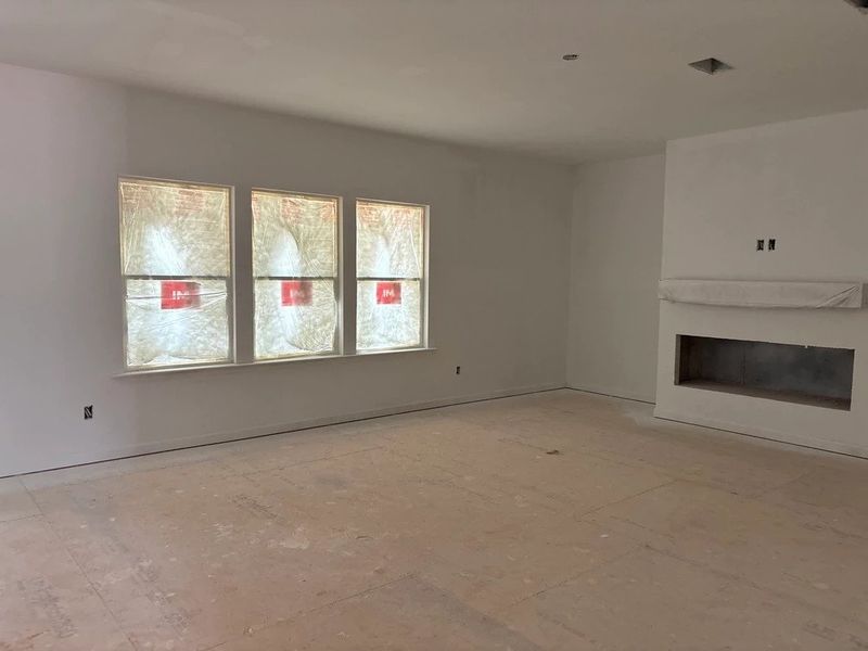 Family Room featuring the AW Collection® Serene - Open space with natural finishes and light. Family Room featuring the AW Collection® Serene - Open space with natural finishes and light.