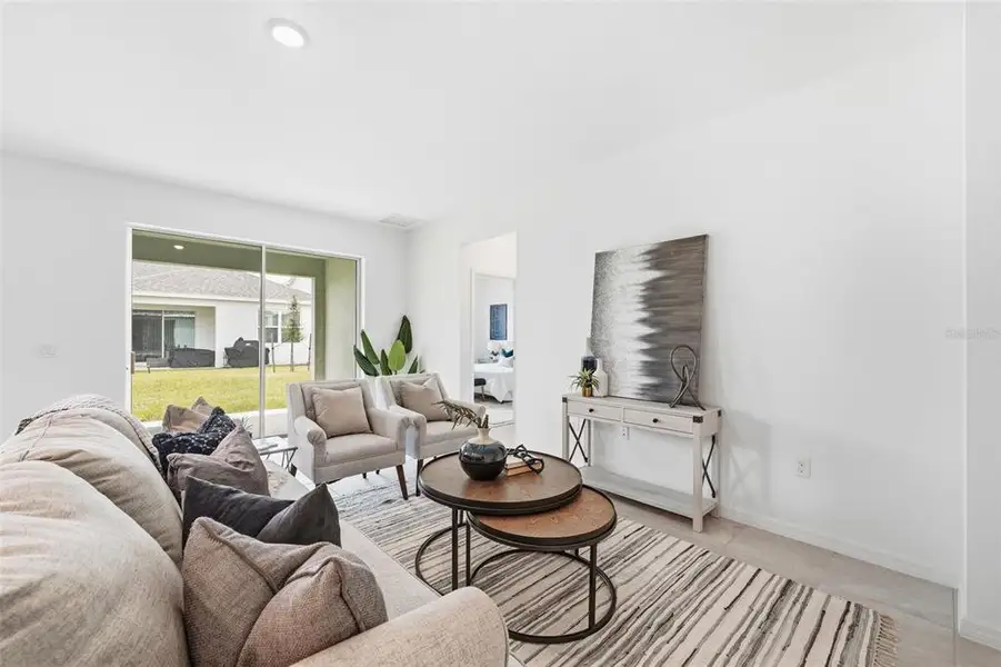 Furnished interior view inside a new home in Trinity Place, St. Cloud (Image 6).