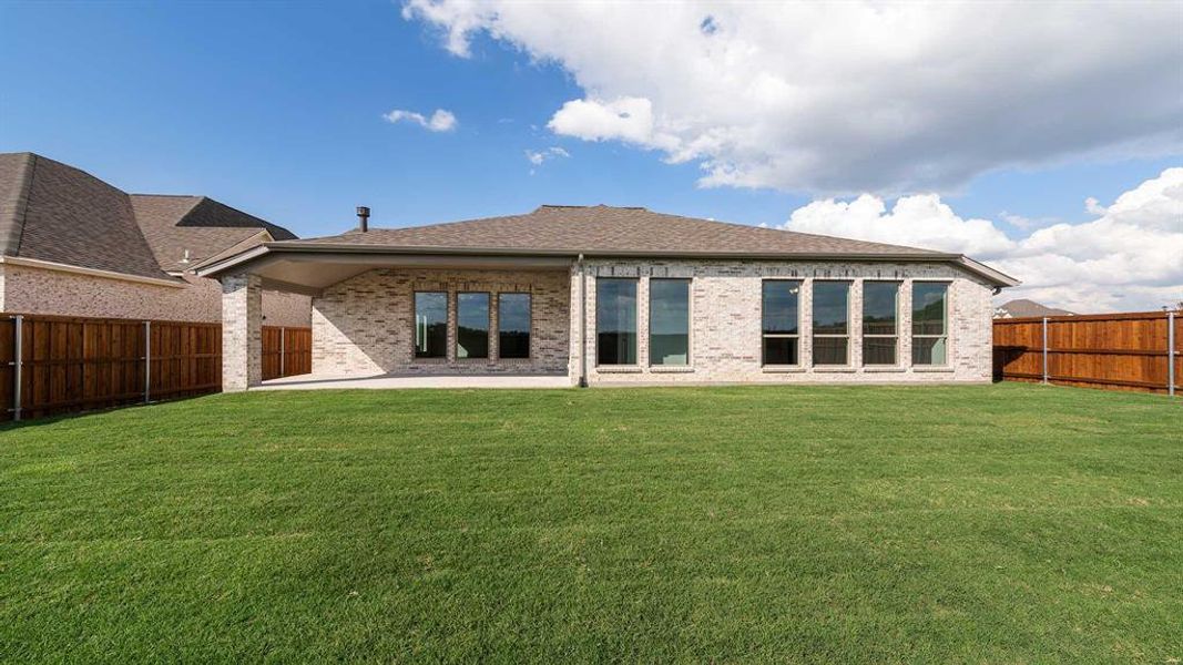 Exterior details and patio area of a home in Terraces 62', Rockwall (Image 4). Exterior details and patio area of a home in Terraces 62', Rockwall (Image 4).