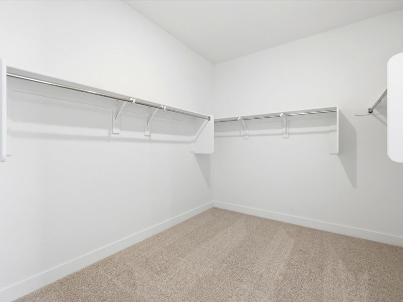 Spacious, unfurnished interior of a new home in White Tank Foothills Signature Series, Waddell (Image 15).
