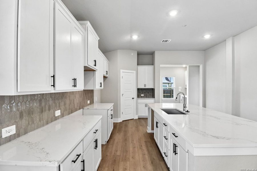 Furnished interior view inside a new home in Estancia Ranch - Premier Series, San Antonio (Image 13).