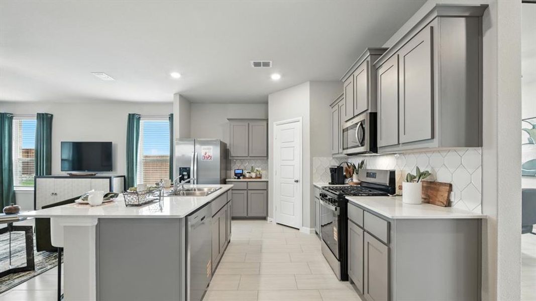 Furnished interior view inside a new home in Monarch at the Meadows, Denton (Image 9). Furnished interior view inside a new home in Monarch at the Meadows, Denton (Image 9).