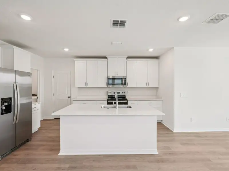 Furnished interior view inside a new home in Crosswinds - Classic Series, Haines City (Image 3).