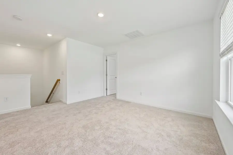 Spacious, unfurnished interior of a new home in Forestville Station, Wake Forest (Image 28).
