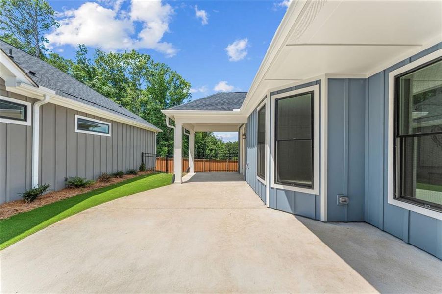 Exterior details and patio area of a home in The Courtyards at Redbud Lane, Canton (Image 14).