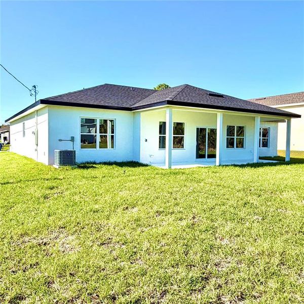 Exterior details and patio area of a home in , Palm Bay (Image 30).